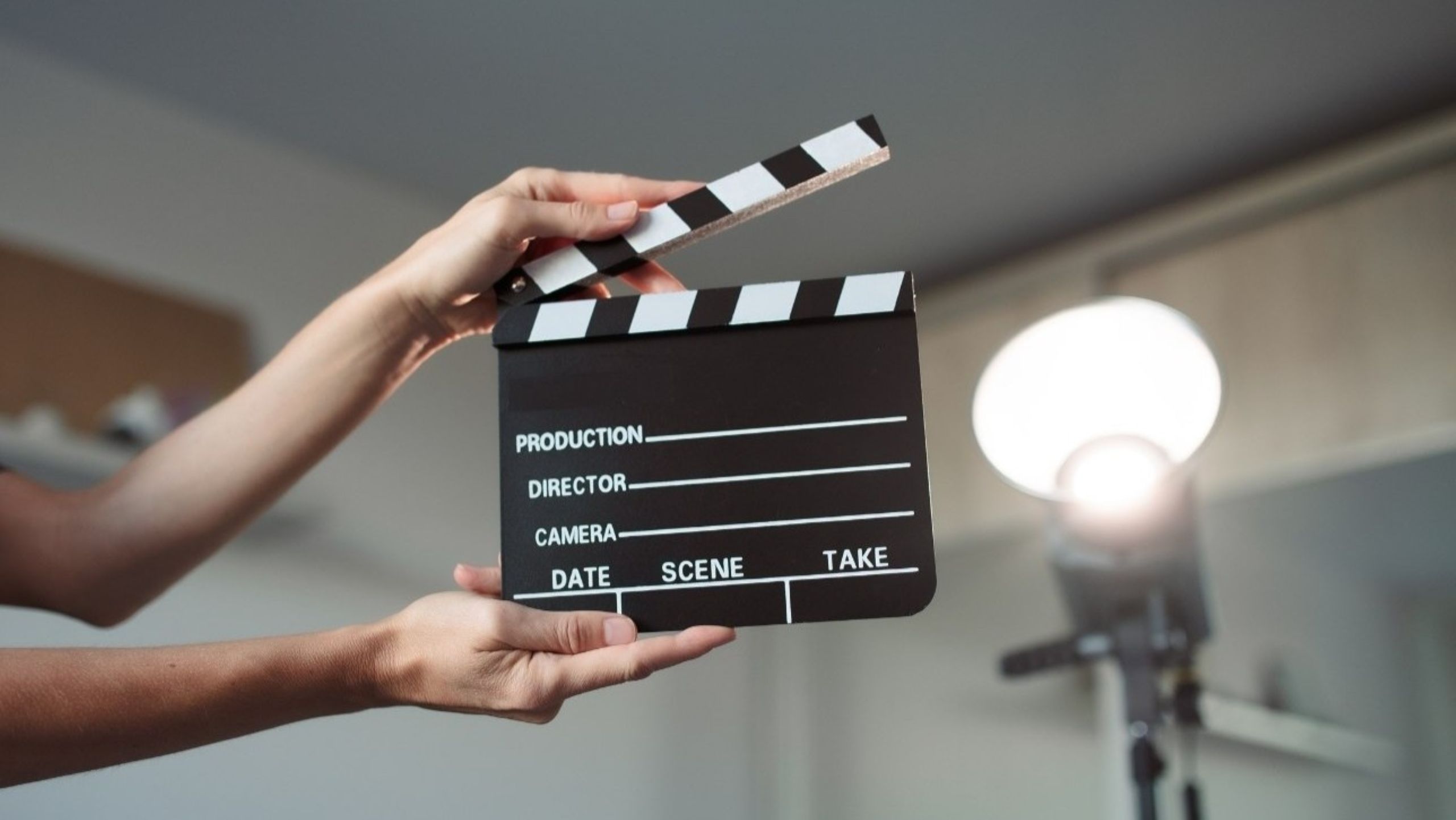 Film industry production set showing Indian content creation and entertainment economics with camera equipment