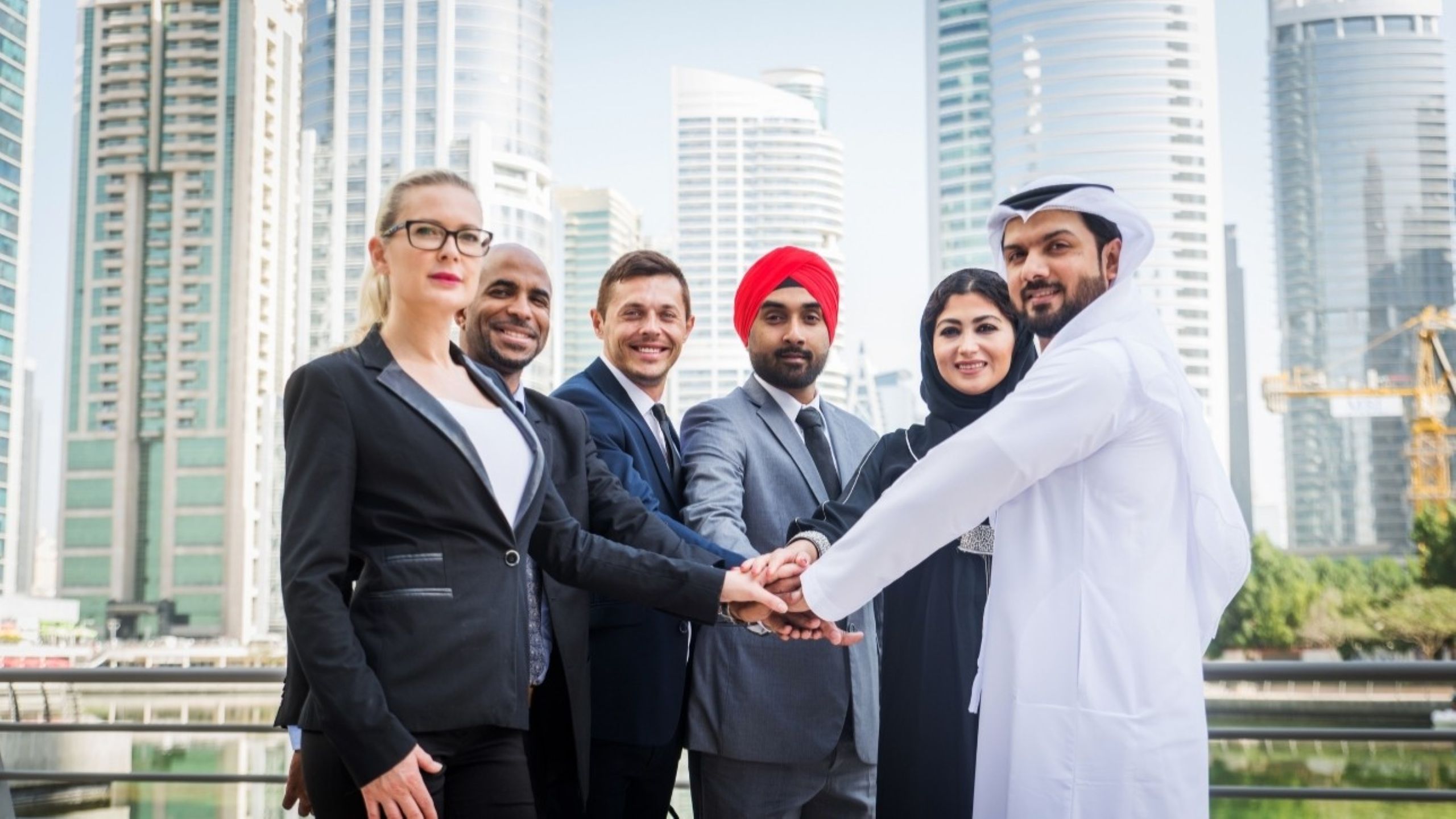 Indian and Gulf business professionals shaking hands representing the growing India GCC trade and investment partnership in 2026