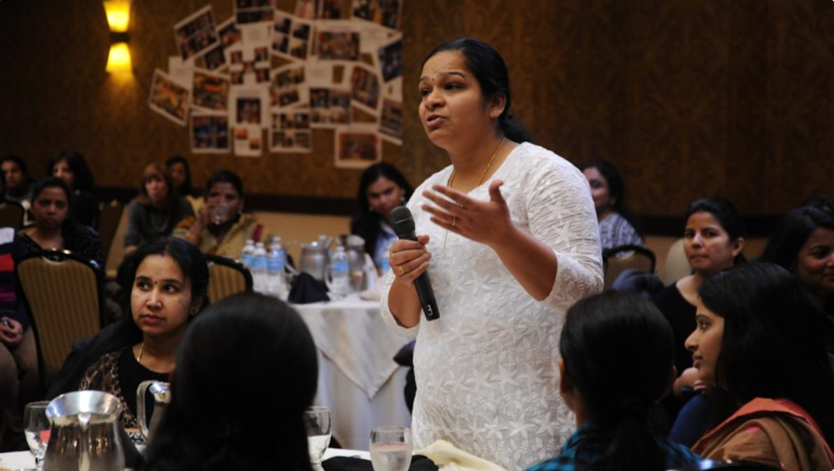 A young Indian woman founder speaks in a conference about building her D2C brand from home in India