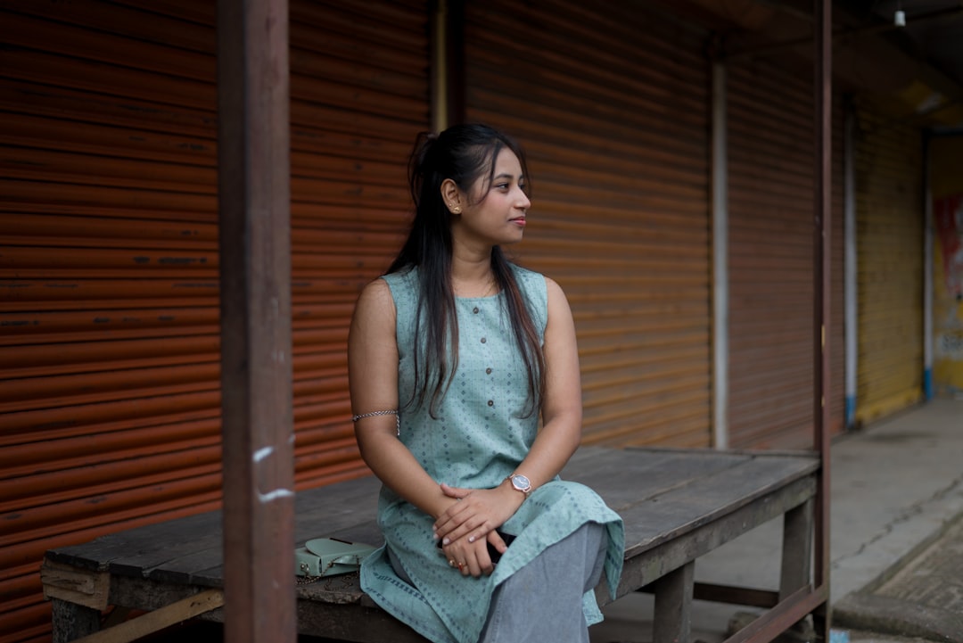 AIndian woman in a breathable linen kurta demonstrates why ethical fabrics are best choice for India's humid monsoon season.