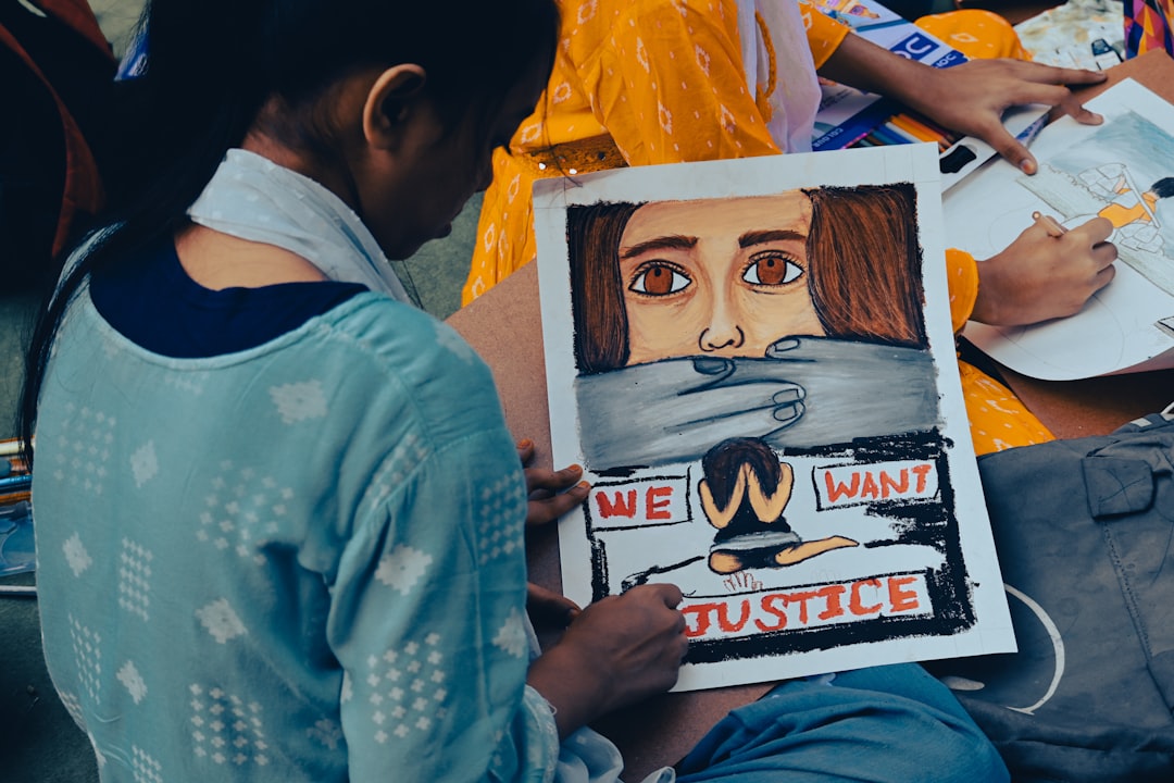 Young Cockroach Janta Party supporters hold signs at a protest in New Delhi demanding exam reform