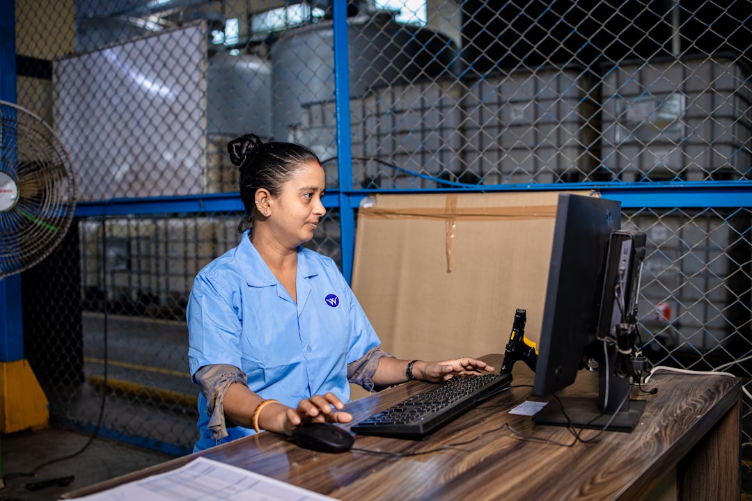 A woman seller reviewing festive procurement stock in a warehouse in India