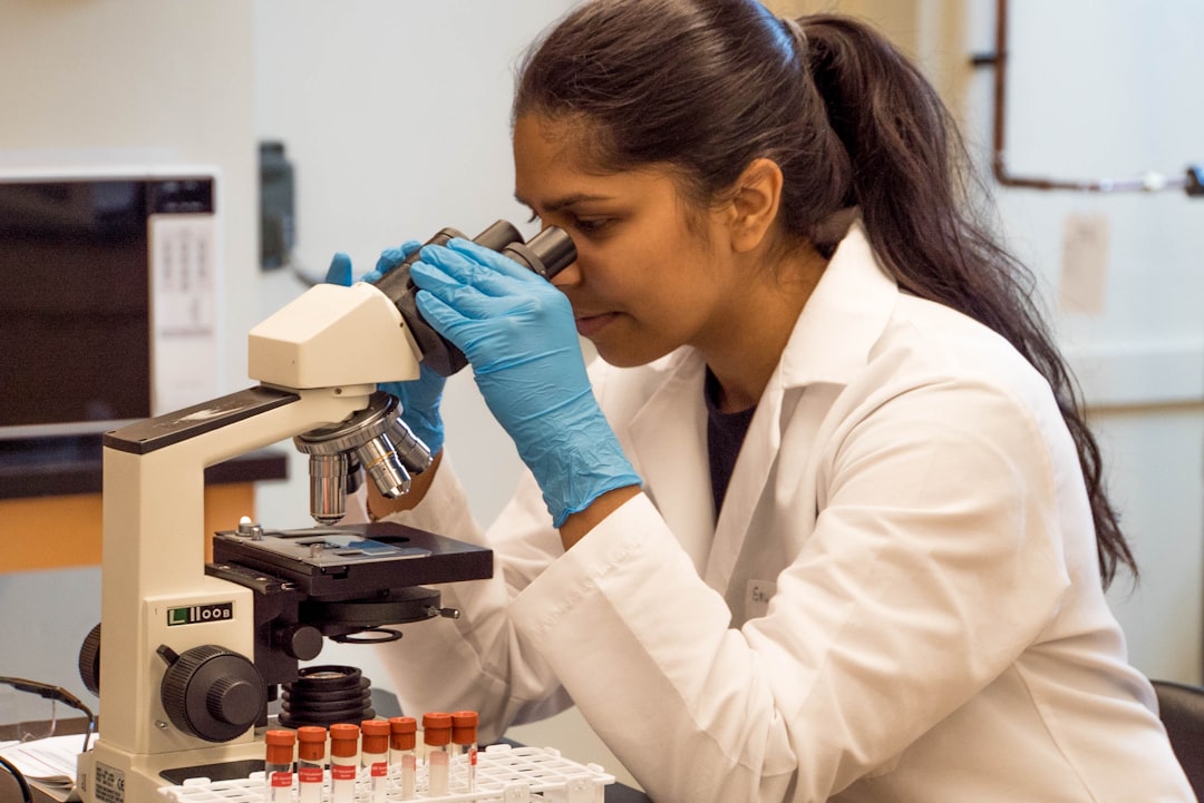 An Indian-origin woman scientist reviews data in a NASA laboratory, representing the growing role of Indian scientists.