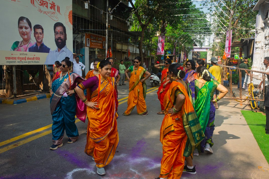 Women in an embroidered chaniya-choli spins during Navratri celebrations at a community Garba night